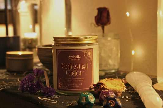 A jar of candles sitting on top of a table